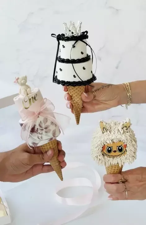 Cone cakes held in hand